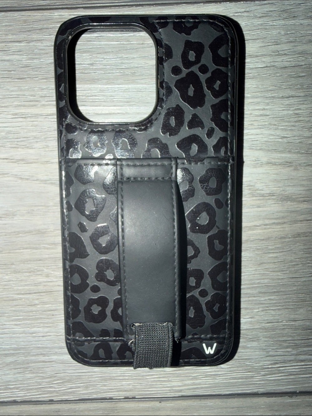 Walli Case Black Leopard Print Phone Case with Rear Hand Strap and pocket.
